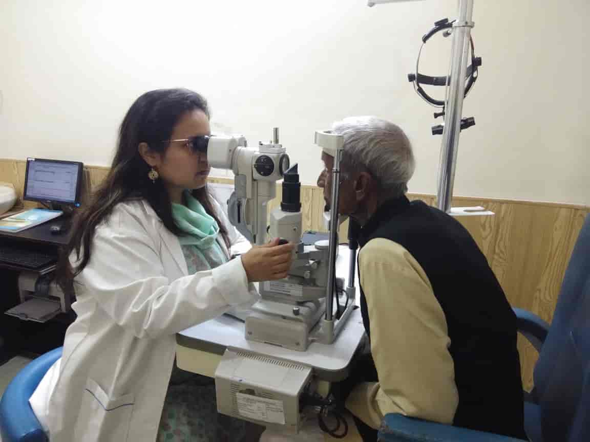 Dr. Swati Goyal examining a patient at the slit lamp